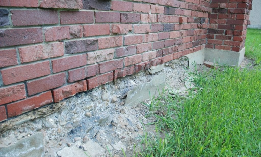 A home that needs foundation repairs. Fixing your Foundation Problems with BDB Waterproofing.