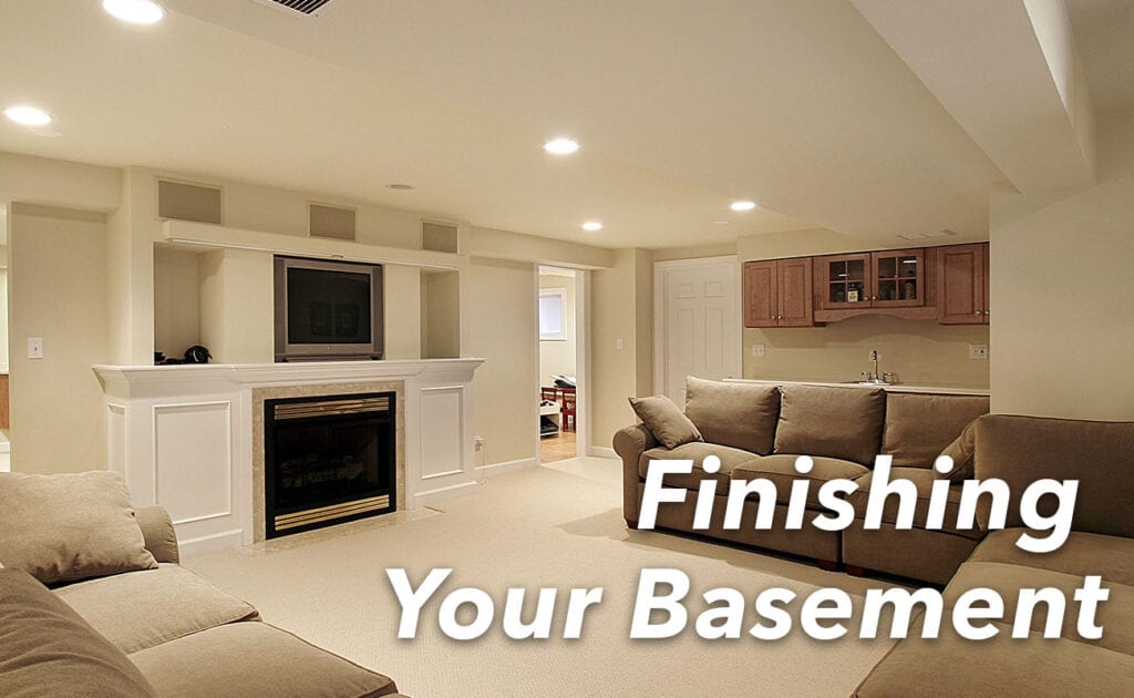 A finished basement that is set up to look like a living room.