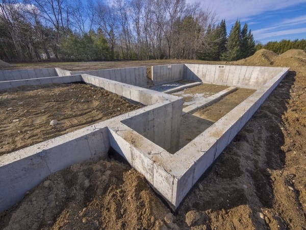 The foundation of a home is set up. It is large enough to include a basement.