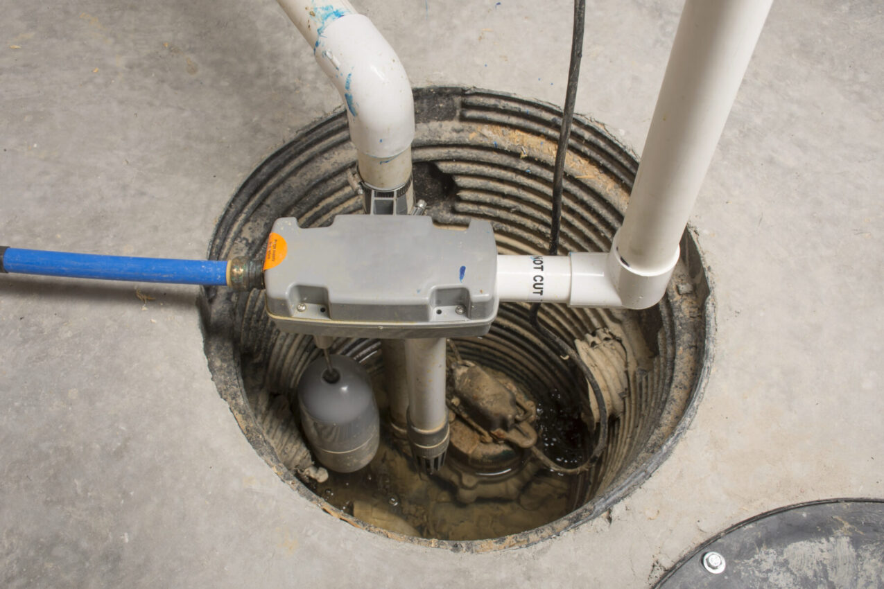 A sump pump is installed in this basement.