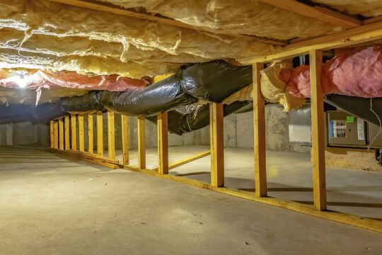 A crawl space set up underneath a home.