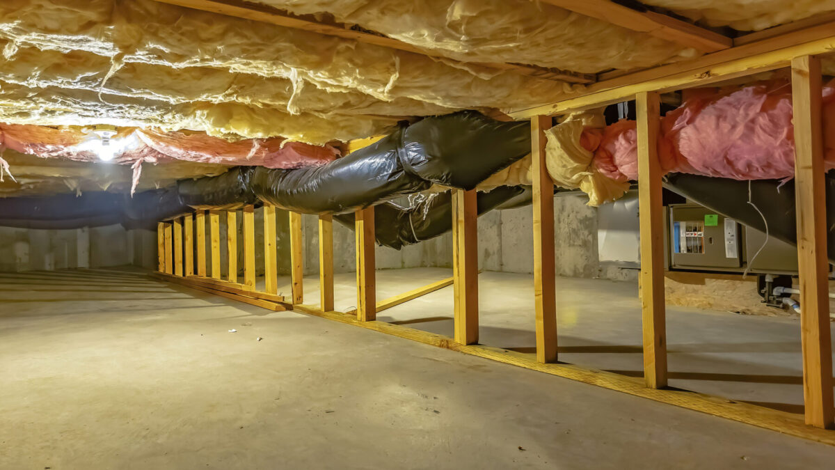A crawl space set up underneath a home.